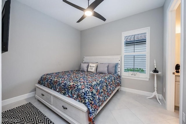 bedroom featuring light tile patterned floors and ceiling fan