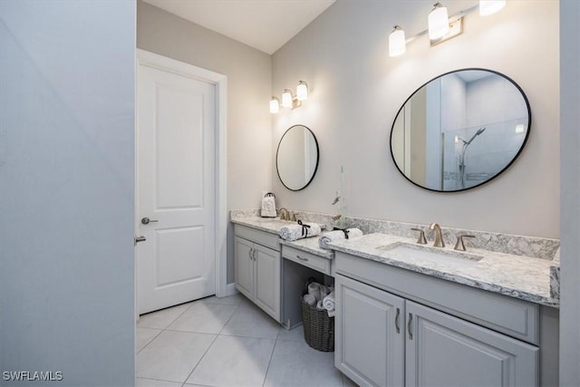 bathroom featuring tile patterned floors and vanity