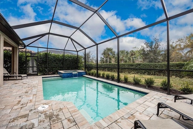 view of pool featuring a lanai, a patio, and an in ground hot tub