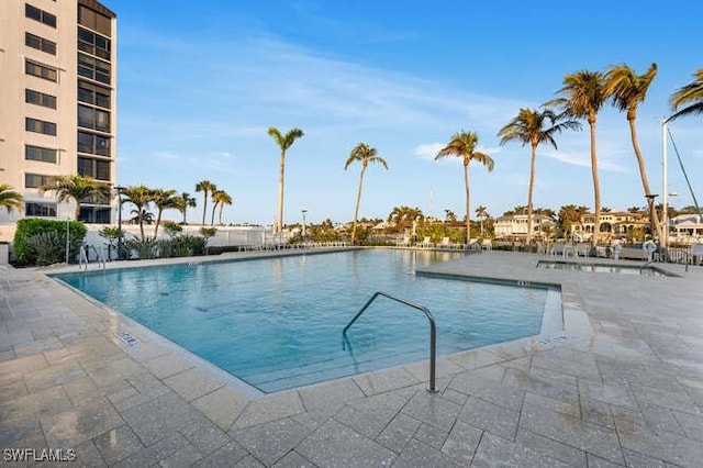 pool with a patio area