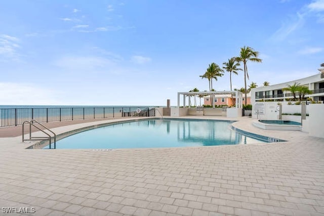 2340 Gulf Shore Blvd N Unit 108, Naples, FL 34103 - community pool with a patio, fence, and a community hot tub