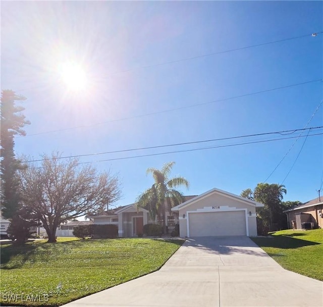 view of front of home with a garage and a front yard