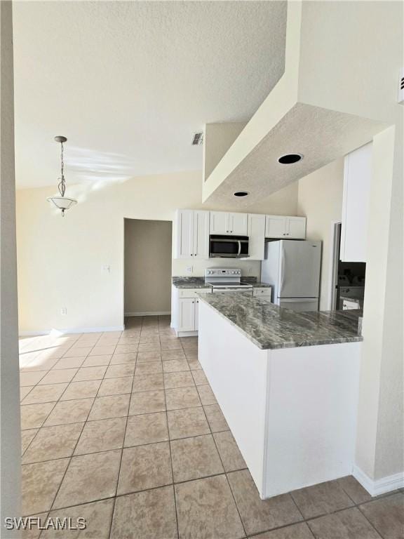 kitchen featuring pendant lighting, light tile patterned floors, white appliances, and white cabinets