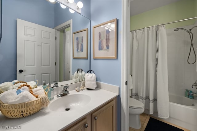 full bathroom with tile patterned flooring, vanity, shower / bath combo, and toilet