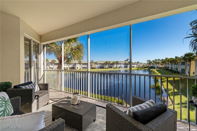 sunroom with a water view