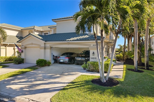 view of front of home featuring a garage and a front yard