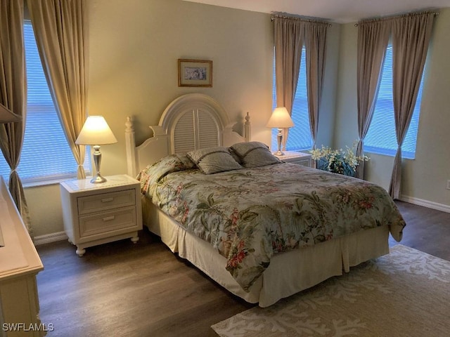 bedroom featuring dark hardwood / wood-style floors