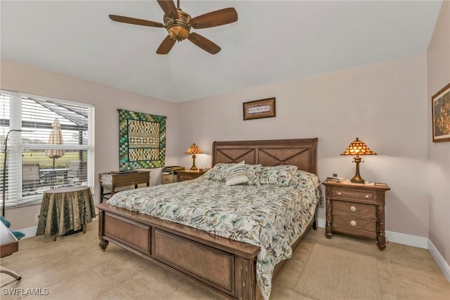 bedroom with ceiling fan and lofted ceiling