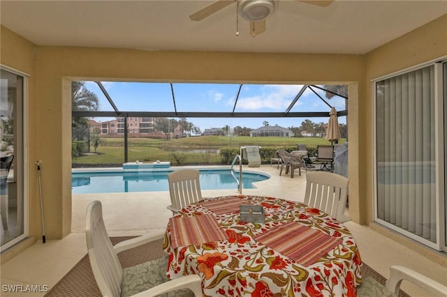 view of pool with ceiling fan