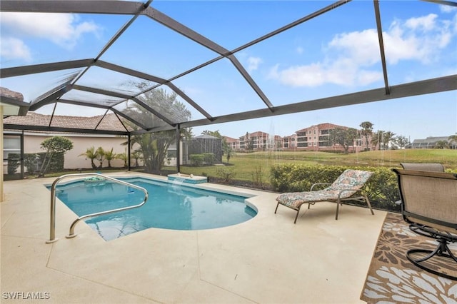 view of swimming pool featuring a lanai and a patio