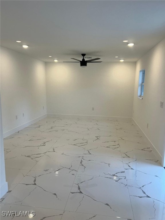 spare room featuring ceiling fan