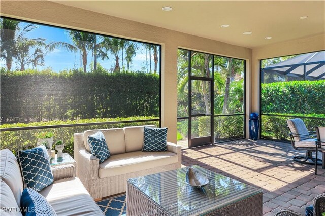 sunroom featuring a wealth of natural light