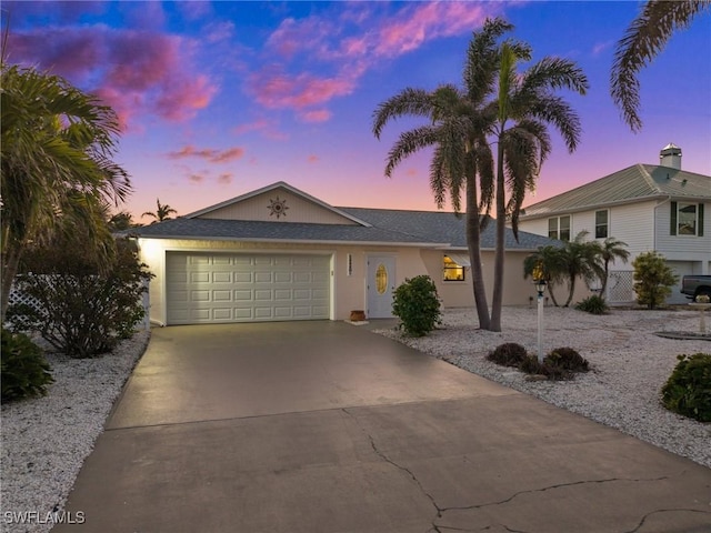 ranch-style house with a garage