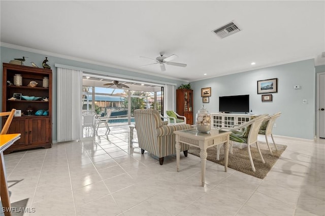 tiled living room with crown molding and ceiling fan