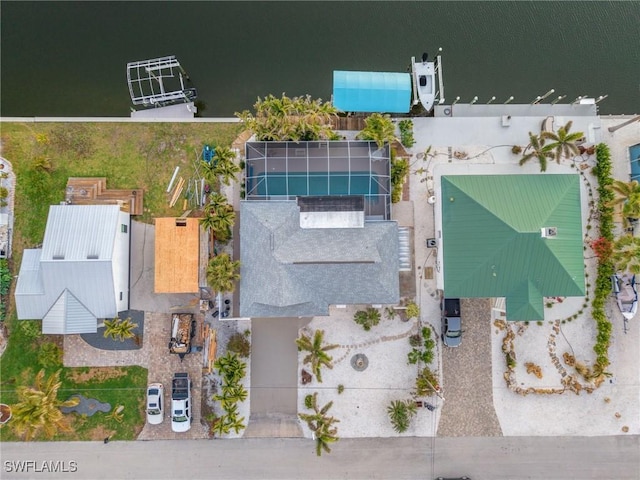 birds eye view of property featuring a water view