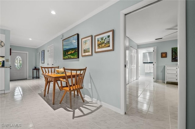 dining area with crown molding