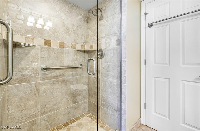 bathroom featuring an enclosed shower