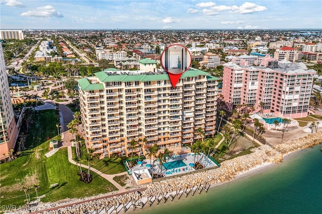 birds eye view of property featuring a water view