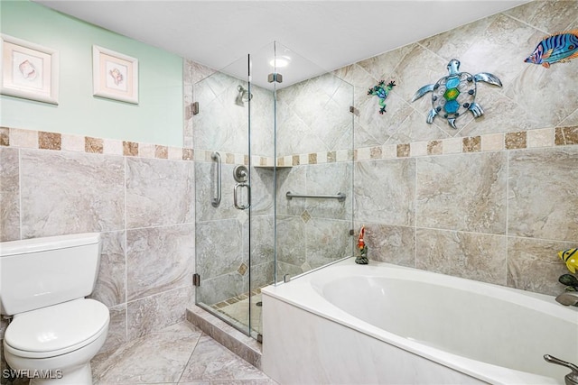 bathroom featuring toilet, tile walls, and plus walk in shower