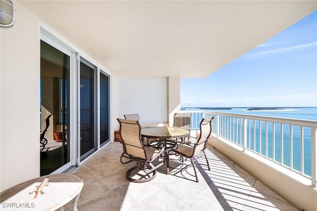 balcony featuring a water view