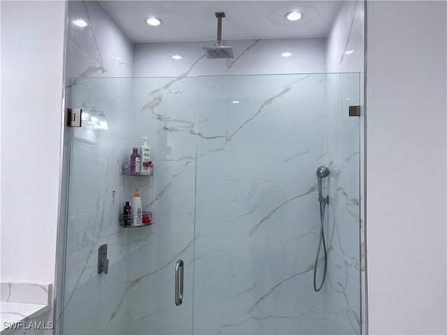 bathroom with an enclosed shower