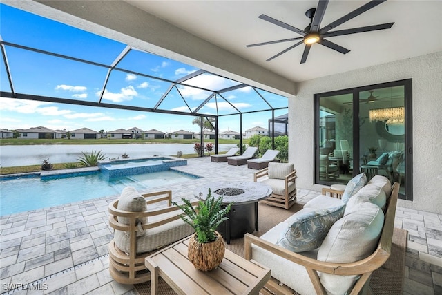 view of patio / terrace featuring a water view, a swimming pool with hot tub, an outdoor hangout area, and glass enclosure