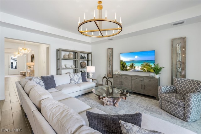 living room with an inviting chandelier