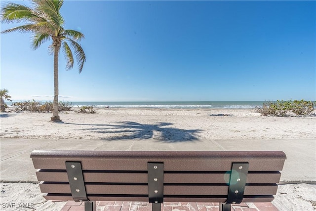 property view of water featuring a beach view