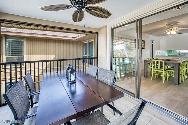 balcony featuring ceiling fan