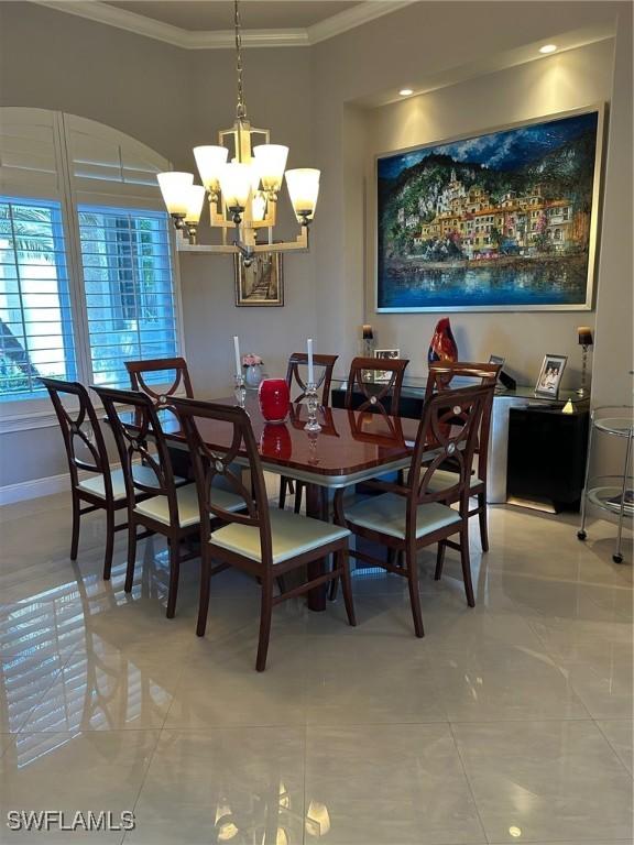 tiled dining area with crown molding