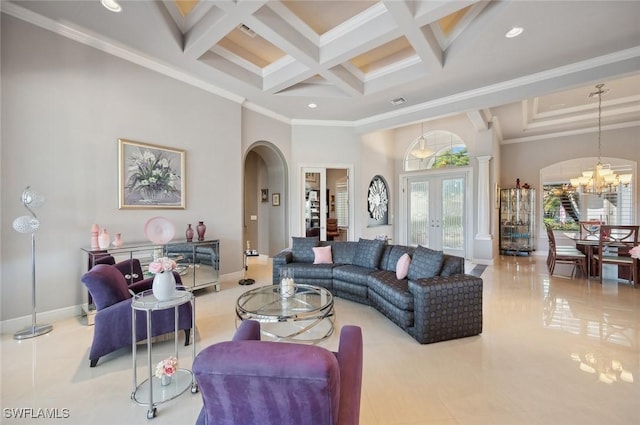 tiled living room with french doors, coffered ceiling, a notable chandelier, a towering ceiling, and beam ceiling