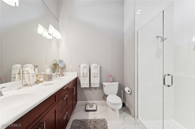 bathroom featuring vanity, toilet, and walk in shower