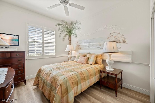 bedroom featuring ceiling fan and light wood-type flooring