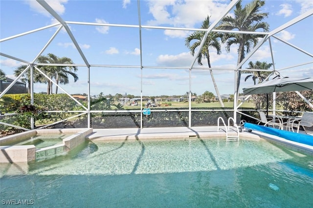 view of swimming pool with a lanai and an in ground hot tub