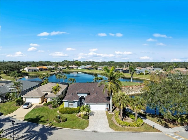 aerial view featuring a residential view and a water view