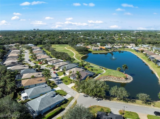 birds eye view of property with a residential view, view of golf course, and a water view