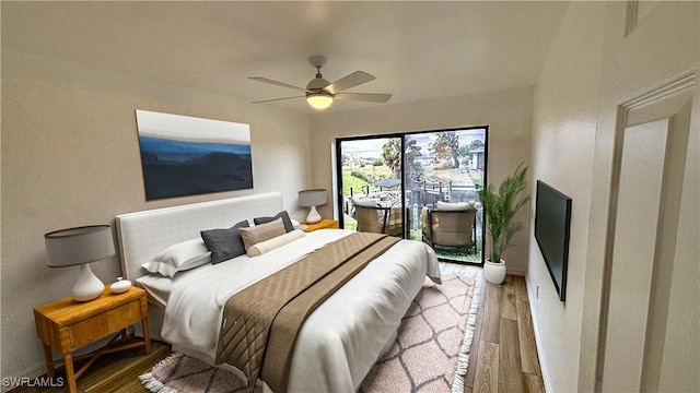 bedroom with hardwood / wood-style flooring and ceiling fan