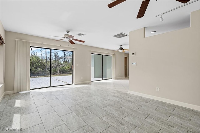 empty room featuring ceiling fan