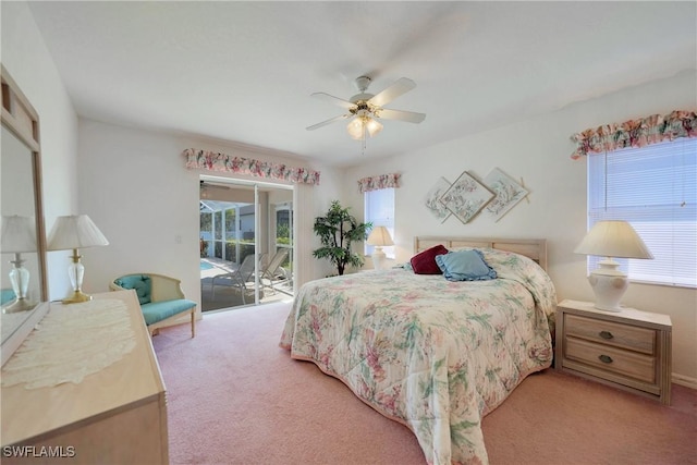 carpeted bedroom featuring access to exterior and ceiling fan