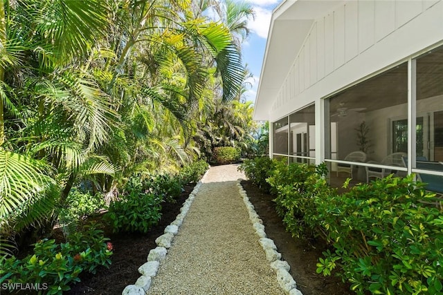 view of yard with a sunroom