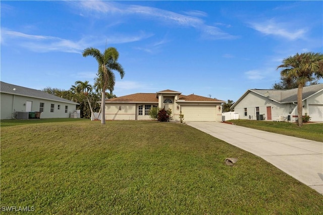 ranch-style house with cooling unit, a garage, and a front yard