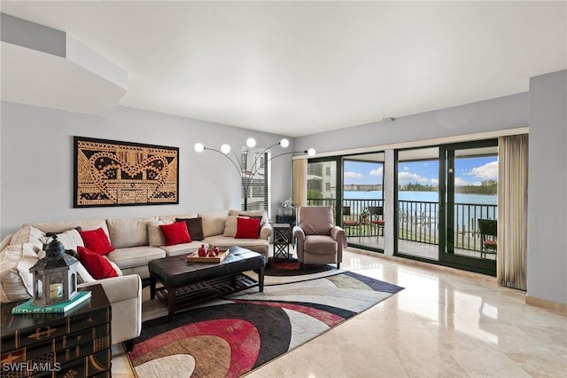 living room featuring a water view