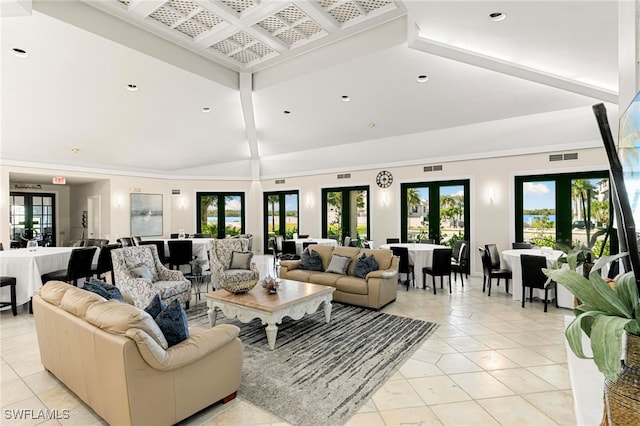 living room with french doors and light tile patterned floors