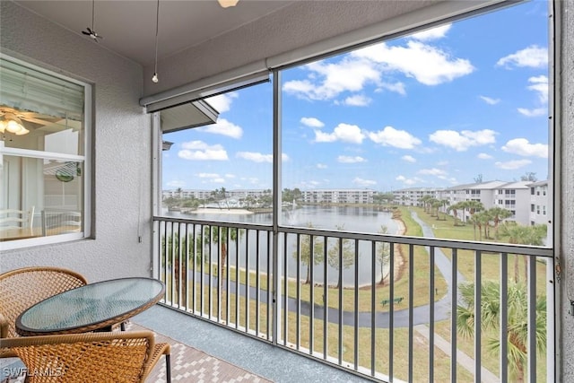 sunroom with a water view