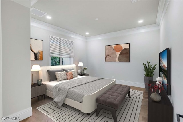 bedroom featuring hardwood / wood-style flooring and ornamental molding