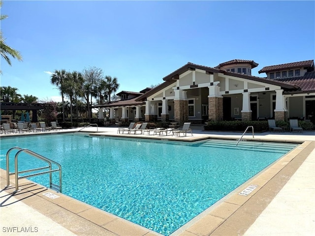 view of swimming pool featuring a patio