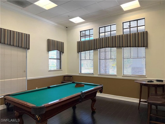 game room with pool table, a wealth of natural light, ornamental molding, and wood-type flooring