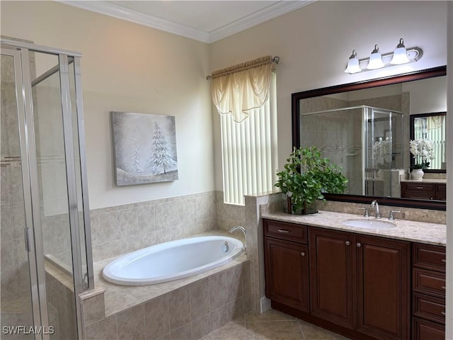 bathroom featuring crown molding, vanity, plus walk in shower, and tile patterned flooring