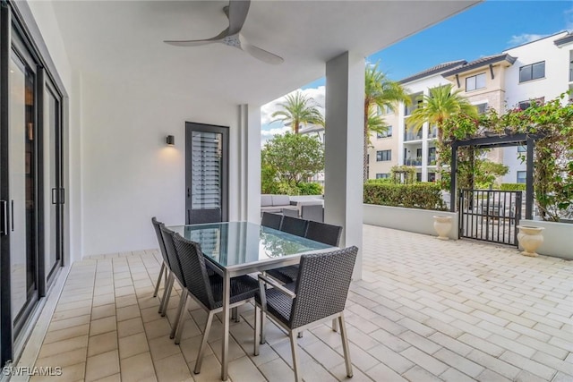 view of patio featuring ceiling fan