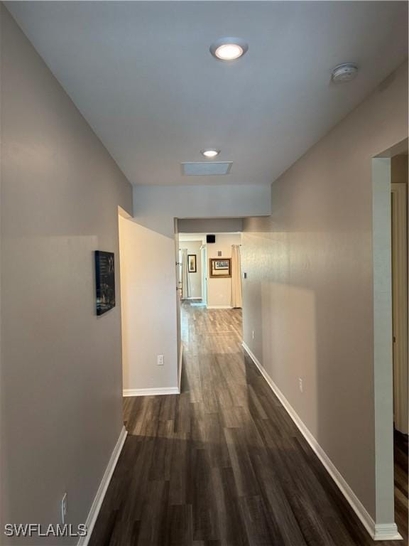 hallway featuring dark hardwood / wood-style floors